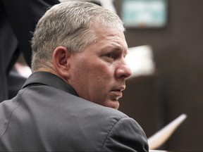 In this Dec. 3, 2012 file photo, former baseball player Lenny Dykstra sits during his sentencing for grand theft auto in Los Angeles. (AP Photo/Nick Ut, File)