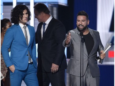 Dan Smyers, left, and Shay Mooney, of Dan + Shay, accept the award for single of the year for "Tequila" at the 54th annual Academy of Country Music Awards at the MGM Grand Garden Arena on Sunday, April 7, 2019, in Las Vegas.