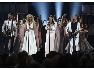 Jimi Westbrook, from left, Kimberly Schlapman, Karen Fairchild and Philip Sweet, of Little Big Town, perform "The Daughters" at the 54th annual Academy of Country Music Awards at the MGM Grand Garden Arena on Sunday, April 7, 2019, in Las Vegas.