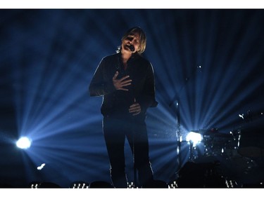 Keith Urban performs "Burden" at the 54th annual Academy of Country Music Awards at the MGM Grand Garden Arena on Sunday, April 7, 2019, in Las Vegas.