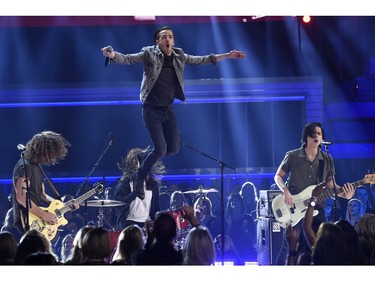 Eric Steedly, from left, Brandon Lancaster and Chandler Baldwin, of Lanco, perform "Rival" at the 54th annual Academy of Country Music Awards at the MGM Grand Garden Arena on Sunday, April 7, 2019, in Las Vegas.