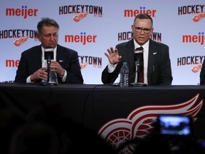 Steve Yzerman, right, addresses media during a press conference where he was introduced as the new executive vice-president and general manager of the Detroit Red Wings, Friday, April 19, 2019, in Detroit.. At left is senior vice-president Ken Holland.