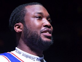 Entertainer Meek Mill looks to the crowd before the game before the Philadelphia 76ers and Miami Heat at Wells Fargo Center on April 24, 2018 in Philadelphia, Pennsylvania.