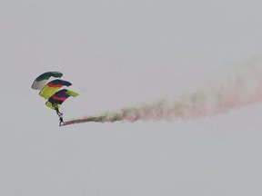 Pakistani commandos from Special Services Group (SSG) perform a parachute jump during the rehearsal for the Pakistan Day parade in Islamabad on March 18, 2019.