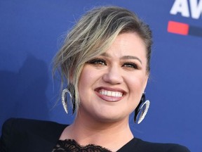 US singer Kelly Clarkson arrives for the 54th Academy of Country Music Awards on April 7, 2019, at the MGM Grand Garden Arena in Las Vegas, Nevada.