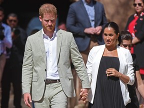 In this file photo taken on February 25, 2019 Prince Harry and his wife Meghan, Duke & Duchess of Sussex, visit the Kasbah of the Udayas near the Moroccan capital Rabat.