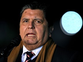 In this file photo taken on Sept. 30, 2010 Peruvian President Alan Garcia gestures as he speaks upon his arrival at the military airport in Buenos Aires. (ALEJANDRO PAGNI/AFP/Getty Images)