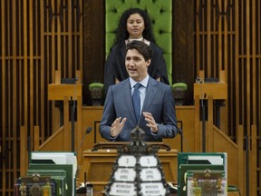 Daughters of the Vote Speaker and delegate for Halifax-West Ampai Thammachack looks on as Prime Minister Justin Trudeau speaks to Daughters of the Vote in the House of Commons on Parliament Hill in Ottawa, Wednesday April 3, 2019. THE CANADIAN PRESS/Adrian Wyld
