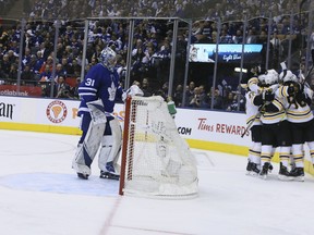 Maple Leafs Frederik Andersen looks on as the Boston Bruins celebrate a goal during Game 4 last night at Scotiabank Arena. (VERONICA HENRI/TORONTO SUN)