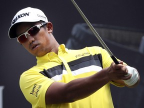 In this Feb. 10, 2017 file photo, Arie Irawan of Malaysia tees off during the second day of the Maybank Championship in Kuala Lumpur, Malaysia.