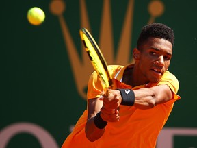 Felix Auger-Aliassime plays a backhand against Alexander Zverev during the Rolex Monte-Carlo Masters at Monte-Carlo Country Club on April 17, 2019 in Monte-Carlo, Monaco. (Clive Brunskill/Getty Images)