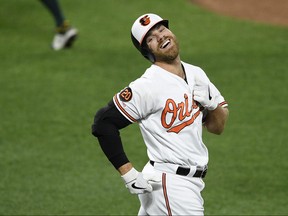 Baltimore Orioles' Chris Davis reacts after he lined out during the third inning of a baseball game against the Oakland Athletics, Monday, April 8, 2019, in Baltimore. (AP Photo/Nick Wass)