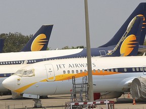 In this April 15, 2019, file photo, Jet Airways aircrafts are seen parked at Chhatrapati Shivaji Maharaj International Airport in Mumbai. (AP Photo/Rafiq Maqbool, File)
