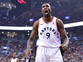 Raptors’ Serge Ibaka reacts after scoring against the Magic on Tuesday. Ibaka and Marc Gasol will have their hands full guarding 76ers centre Joel Embiid in the next series.