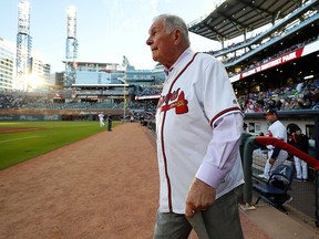 Bobby Cox, former manager of the Atlanta Braves, walks onto the field to give the command to "play ball" prior to the game between the Atlanta Braves and the Chicago Cubs on April 1, 2019 in Atlanta. (Kevin C. Cox/Getty Images)