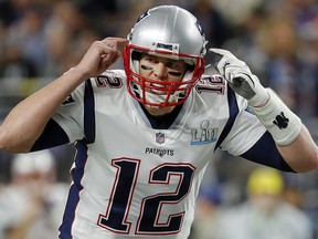 In this Feb. 4, 2018, file photo, New England Patriots quarterback Tom Brady (12) calls a play against the Philadelphia Eagles in Minneapolis. (AP Photo/Charlie Neibergall, File)