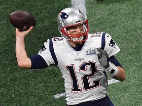 New England Patriots quarterback Tom Brady gets set to pass the ball during Super Bowl LIII against the Los Angeles Rams at Mercedes-Benz Stadium in Atlanta, on February 3, 2019. (ANGELA WEISS/AFP/Getty Images)