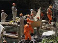 Firefighters search for survivors in the rubble of two buildings that collapsed in the Muzema neighbourhood, in Rio de Janeiro, Brazil, Friday, April 12, 2019.