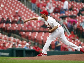 St. Louis Cardinals starting pitcher Adam Wainwright throws during the first inning of a baseball game against the Milwaukee Brewers Wednesday, April 24, 2019, in St. Louis.