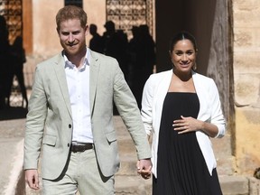 In this Monday, Feb. 25, 2019 file photo, Britain's Prince Harry and Meghan, Duchess of Sussex visit the Andalusian Gardens in Rabat, Morocco, Monday, Feb. 25, 2019.