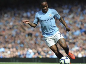 Manchester City's Raheem Sterling runs with the ball during the English Premier League soccer match against Tottenham Hotspur at Etihad stadium in Manchester, England, Saturday, April 20, 2019.