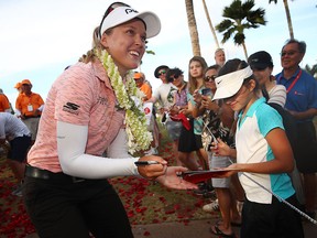 Brooke Henderson signs autographs after winning the LOTTE Championship at Ko Olina Golf Club on April 21, 2019 in Kapolei, Hawaii. (Gregory Shamus/Getty Images)