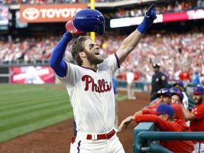Philadelphia Phillies outfielder Bryce Harper celebrates after hitting a home run Saturday, March 30, 2019, in Philadelphia. (AP Photo/Matt Slocum)