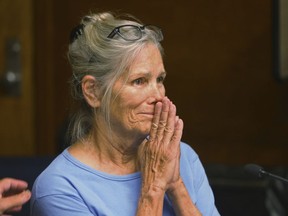 In this Sept. 6, 2017 file photo Leslie Van Houten reacts after hearing she is eligible for parole during a hearing at the California Institution for Women in Corona, Calif.