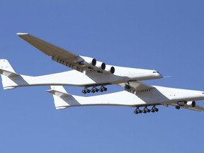 Stratolaunch, a giant six-engine aircraft with the world's longest wingspan , makes its historic first flight from the Mojave Air and Space Port in Mojave, Calif., Saturday, April 13, 2019.
