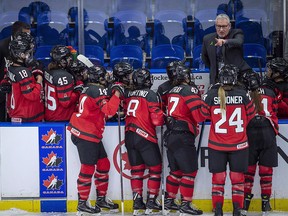 Canada head coach Perry Pearn speaks to his players as they take on Sweden duringthe 2018 Four Nations Cup in Saskatoon, Tuesday, November 6, 2018. (THE CANADIAN PRESS/Liam Richards)