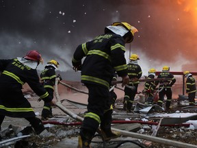 Chinese firefighters battle a blaze in this file photo.