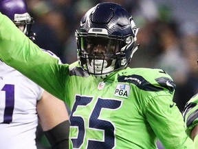 Frank Clark of the Seattle Seahawks celebrates a second quarter defensive stop against the Minnesota Vikings at CenturyLink Field on Dec. 10, 2018 in Seattle, Wash.