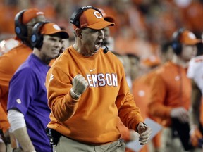 In this Jan. 7, 2019, file photo, Clemson head coach Dabo Swinney reacts during the NCAA championship game against Alabama, in Santa Clara, Calif.