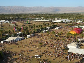 In this April 19, 2015, file photo, festival-goers attend the Coachella Music and Arts Festival in Indio, Calif.