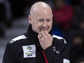 Canada skip Kevin Koe ponders his next shot during a game against Japan at the World Curling Championship in Lethbridge, Alta. on Wednesday, April 3, 2019. (THE CANADIAN PRESS/Paul Chiasson)