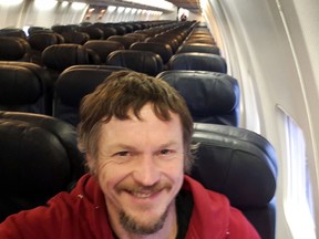 Skirmantas Strimaitis takes a selfie onboard a Boeing 737-800 airplane, taking off from Vilnius, Lithuania, March 16, 2019, as the only passenger aboard. (Skirmantas Strimaitis via AP)