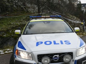 In this Dec. 12, 2018 file photo, a Swedish police crusier is parked on a road leading to Johannesberg Castle in Rimbo, north of Stockholm. (JONATHAN NACKSTRAND/AFP/Getty Images)