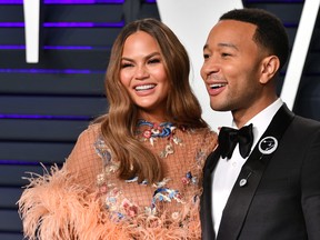 Chrissy Teigen and John Legend attend the 2019 Vanity Fair Oscar Party hosted by Radhika Jones at Wallis Annenberg Center for the Performing Arts on Feb. 24, 2019 in Beverly Hills, Calif.  (Dia Dipasupil/Getty Images)