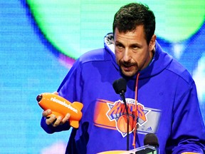 Adam Sandler accepts the Favorite Male Voice from an Animated Movie award for 'Hotel Transylvania 3: Summer Vacation' onstage at Nickelodeon's 2019 Kids' Choice Awards at Galen Center on March 23, 2019 in Los Angeles, Calif.  (Kevin Winter/Getty Images)