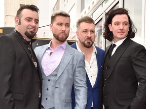 Left to right: Members of 'NSYNC, Chris Kirkpatrick, Lance Bass, JC Chasez and Joey Fatone.  (Alberto E. Rodriguez/Getty Images)
