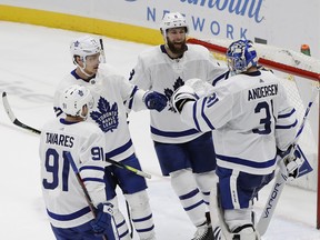 Leafs blueliners Jake Muzzin (second from right) and Nikita Zaitsev (second from left) worked well together in Game 1. (AP)