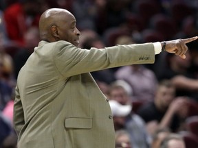 Cleveland Cavaliers head coach Larry Drew yells instructions to players against the Charlotte Hornets, Tuesday, April 9, 2019, in Cleveland.