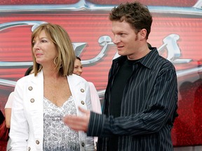 In this May 26, 2006, file photo, NASCAR driver Dale Earnhardt Jr., right, and his mother Brenda Jackson, front left, arrive for the premiere of the Disney/Pixar animated film "Cars" at Lowe's Motor Speedway in Concord, N.C.