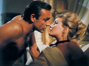 This undated publicity photo provided by United Artists and Danjaq, LLC shows Sean Connery, left, as James Bond in a scene from the 1963 film, "From Russia With Love."
