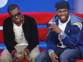 Kanye West (L) and 50 Cent appear on BET's 106 & Park at BET Studios Sept. 11, 2007 in New York City.