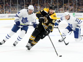 Bruins forward Sean Kuraly carries the puck against the Maple Leafs during Game 7 of their series on Tuesday night in Boston.