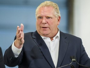 Ontario Premier Doug Ford addresses media at the Thorncrest Ford dealership, near The Queensway and Highway 427, in Toronto on April 1, 2019.