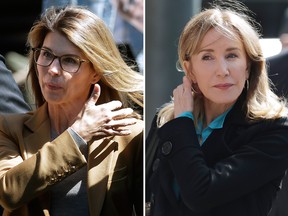 Actresses Lori Loughlin (L) and Felicity Huffman arrive at federal court in Boston on Wednesday, April 3, 2019, to face charges in a nationwide college admissions bribery scandal.