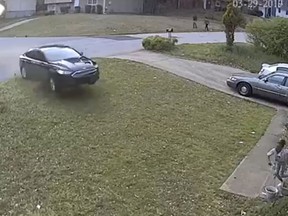 In this video frame grab made available by attorney Chris Stewart, shows a speeding car out of control before it hits LaDerihanna Holmes, 9, as she plays in her front yard Friday, March 29, 2019 in Lithonia, Ga. (Chris Stewart via AP)
