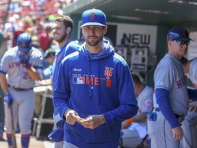 New York Mets' Jacob deGrom stands in the dugout prior to a baseball game against the St. Louis Cardinals, Saturday, April 20, 2019, in St. Louis.